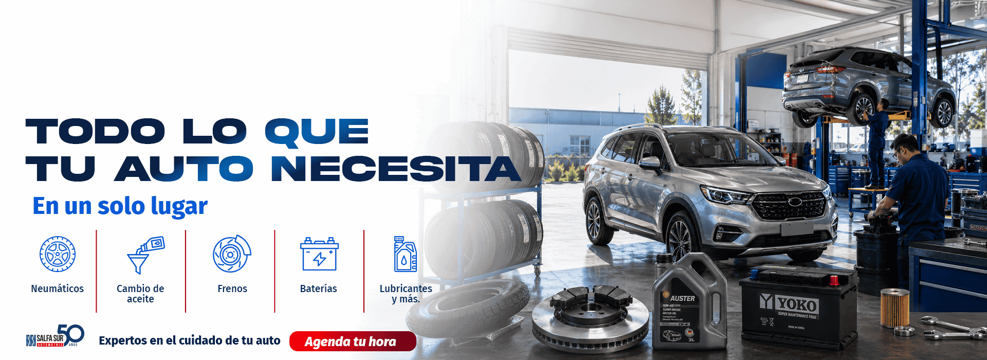 Taller automotriz con vehículos y equipo de reparación en Valdivia.