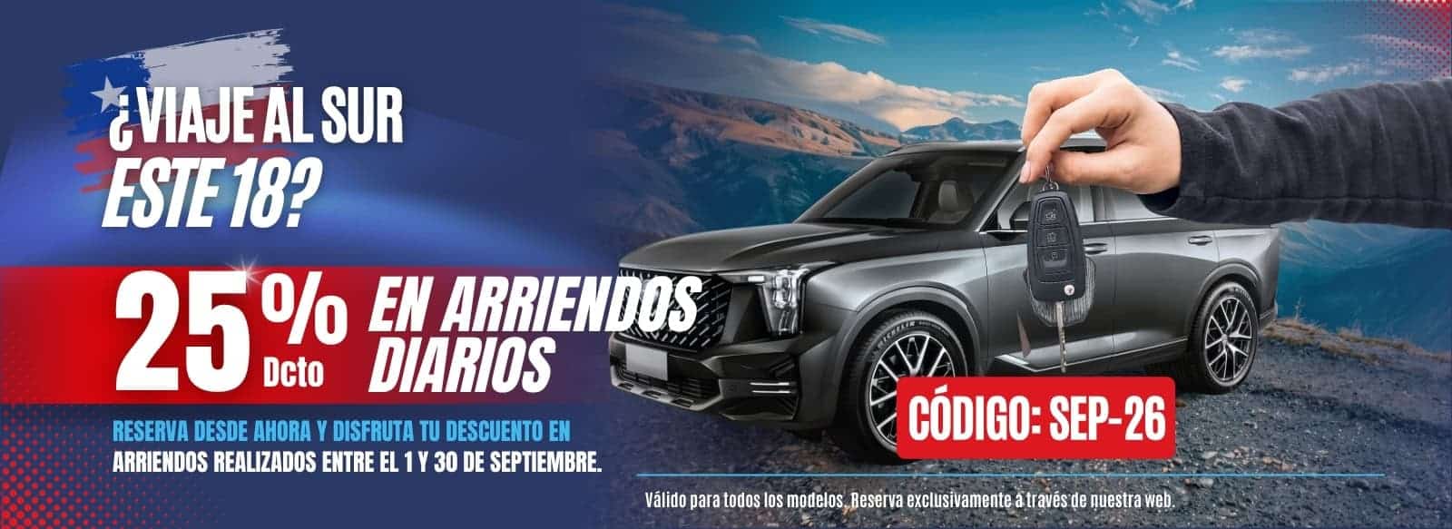Vehículo negro de lujo con llave en mano en paisaje montañoso.
