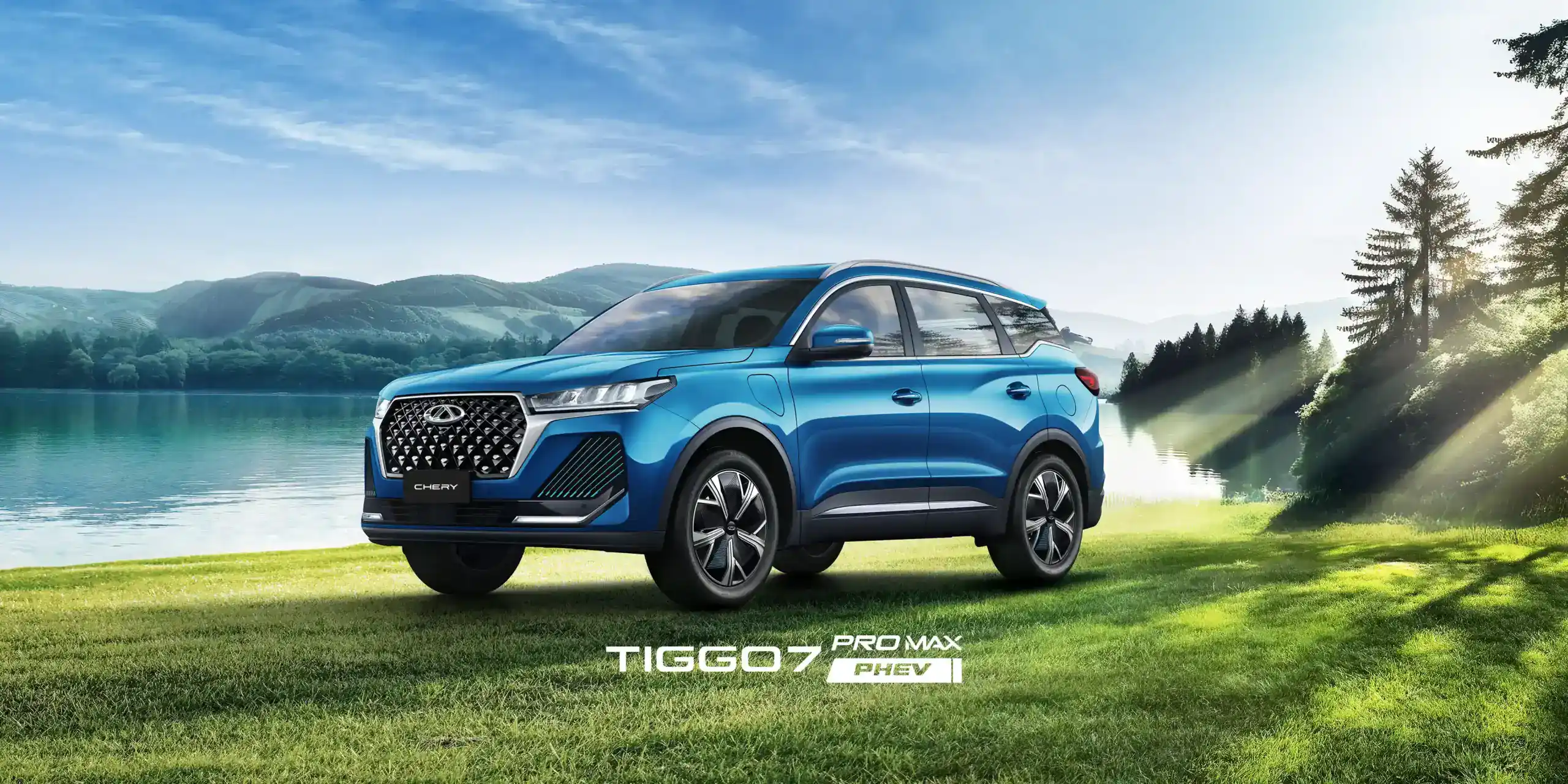 SUV Chery Tiggo 7 Pro Max en paisaje natural con lago y montañas.