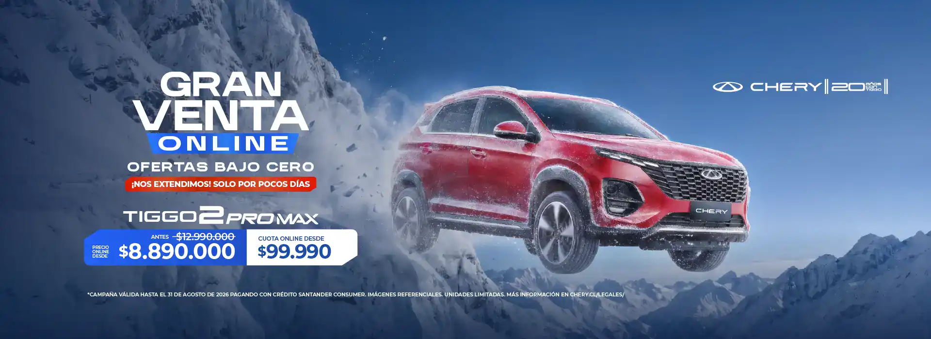 Crossover rojo en paisaje montañoso con nieve en fondo.