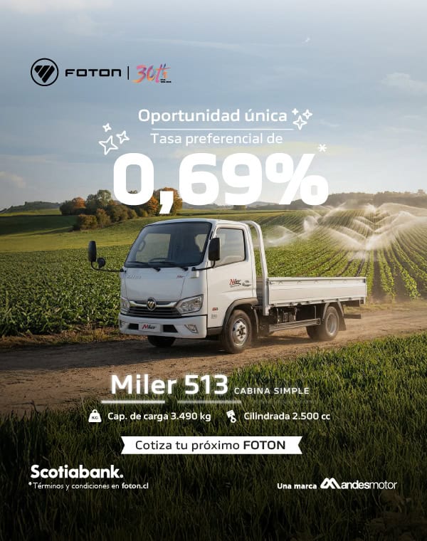 Camión Foton Miler 513 en campo con fondo de cielo y árboles.
