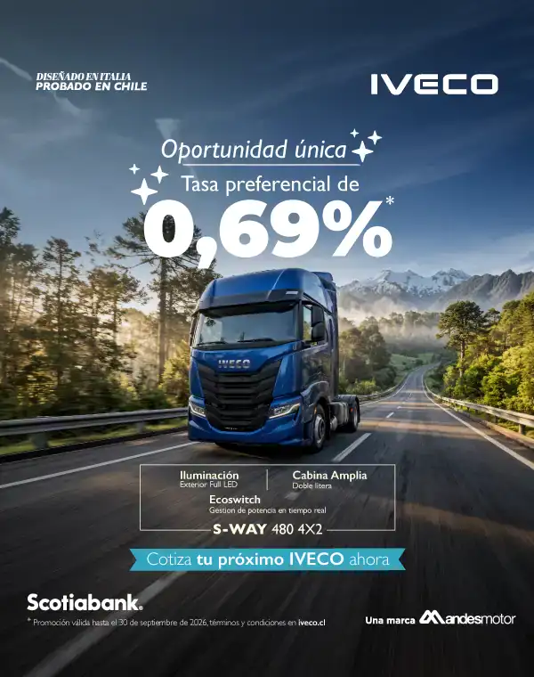 Camión Iveco en carretera con paisaje montañoso y árboles.