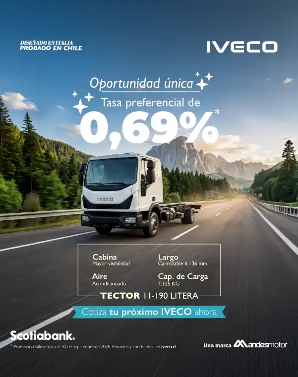 Camión Iveco en carretera con paisaje montañoso y cielo despejado.