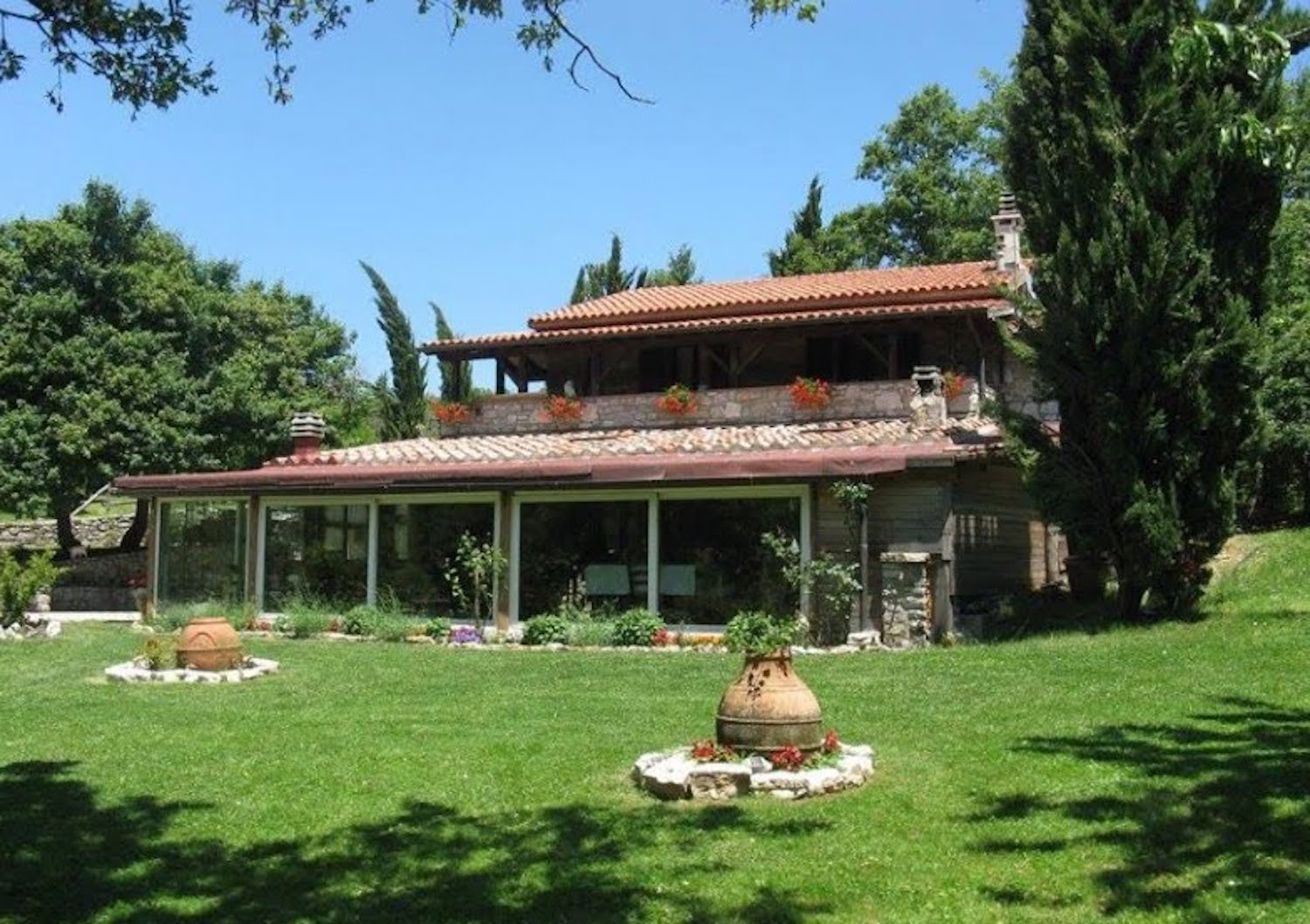 Global Ecovillage Network style villa with garden.