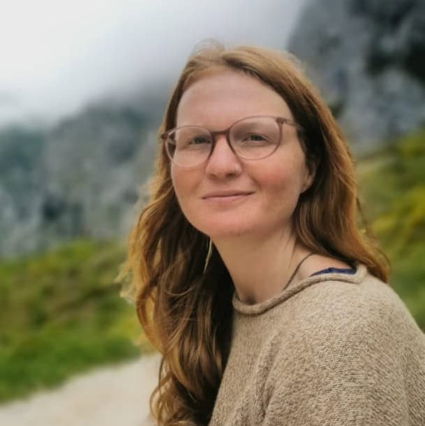 Global Ecovillage Network image featuring Eva Goldfarb outdoors.