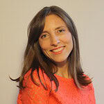 Portrait of Anamaria Aristizabal smiling at Ecovillage event.