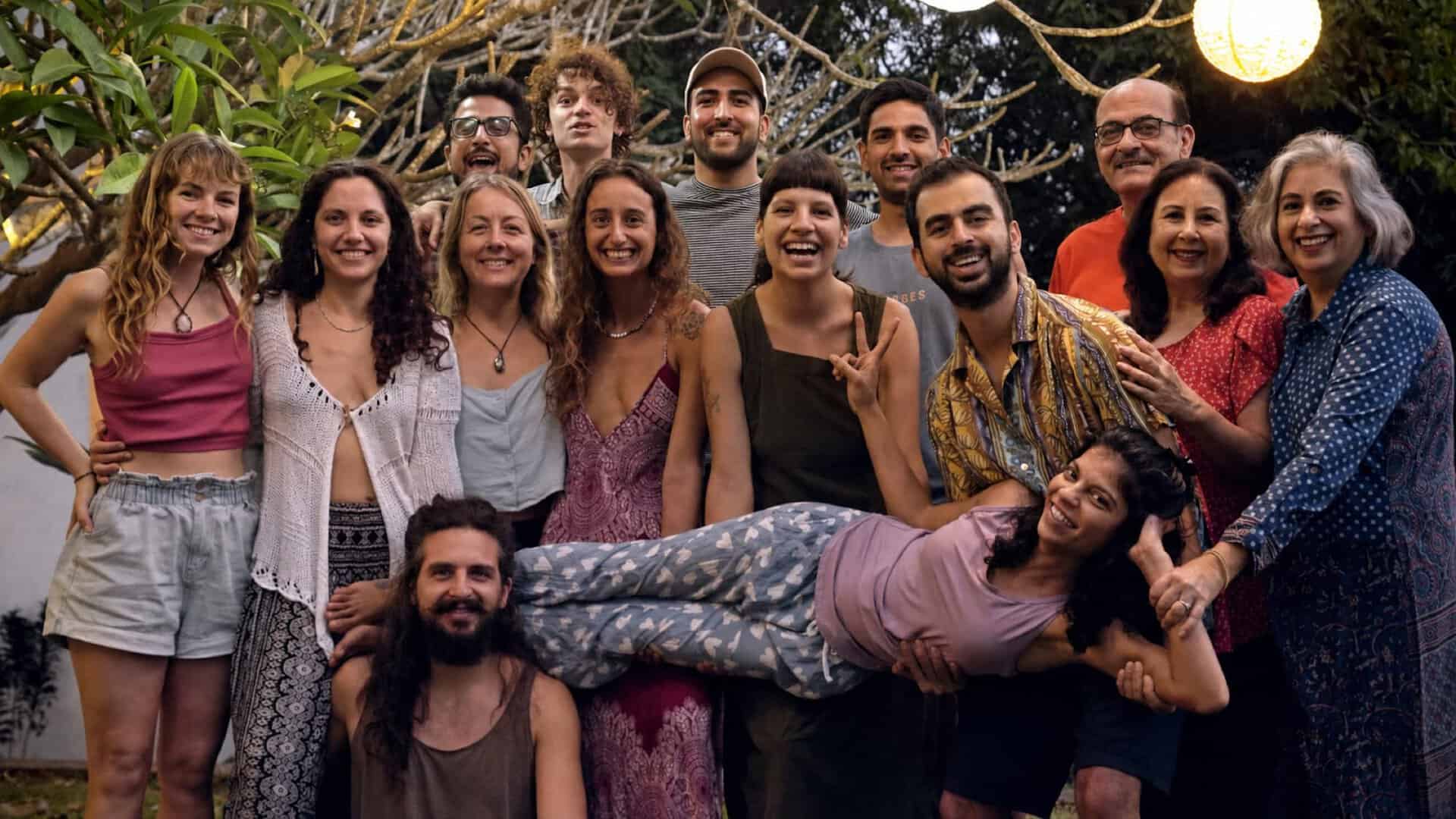 Group of diverse people smiling together at a social gathering.