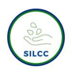 Silcc hand with leaves emblem of SILCC in green and blue circle.