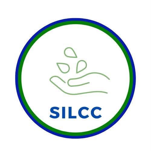 Silcc hand with leaves emblem of SILCC in green and blue circle.