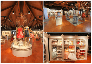 Cherry Tree Lane dress shop displays chic dresses on mannequins, with Disney-inspired accessories celebrating classic park style.