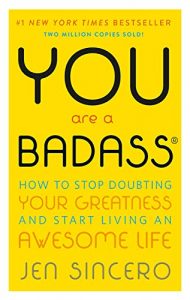 Bright yellow book cover of "You Are a Badass" by Jen Sincero. Text highlights it as a #1 New York Times bestseller, with two million copies sold. Subtitle: "How to Stop Doubting Your Greatness and Start Living an Awesome Life.