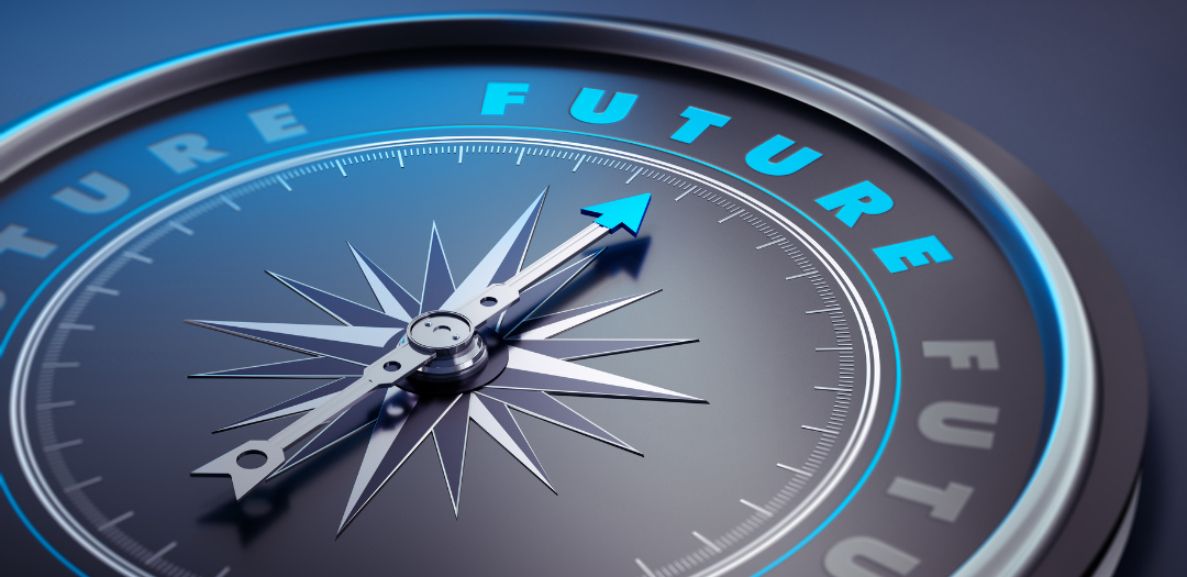 A compass with a bright blue arrow pointing towards the word "FUTURE," symbolizing strategic financial planning and forward-looking business strategy with outsourced CFO services.