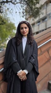 Professional image of Advocate Sonali Sardana, a dedicated legal expert and advocate, standing outdoors in formal attire with a confident expression.