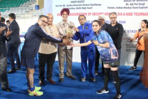 Advocate Sonali Sardana receiving the Best Female Hockey Player Award at the Delhi High Court Bar Association 2nd Hockey Tournament.