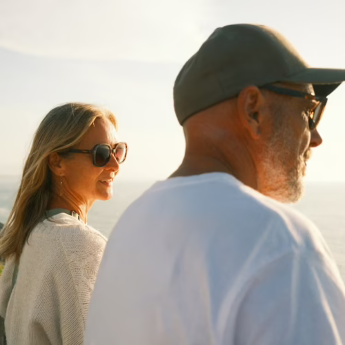 Two adults outdoors representing preventive health, healthy aging, and long-term wellness