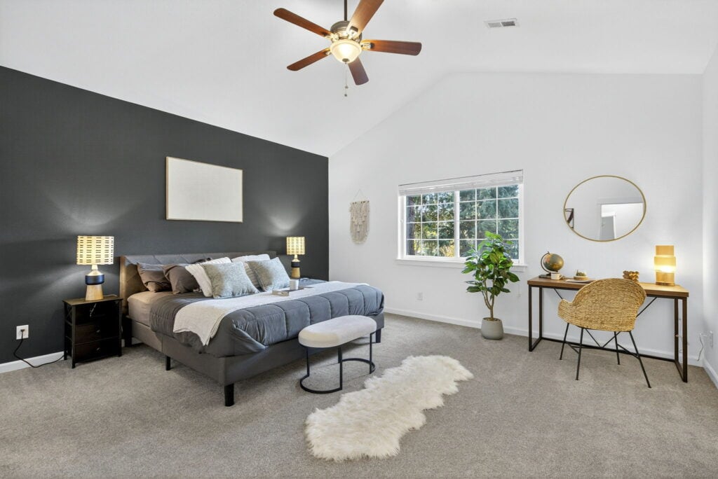 Elegant bedroom featuring contemporary furniture, neutral tones, and inviting lighting.