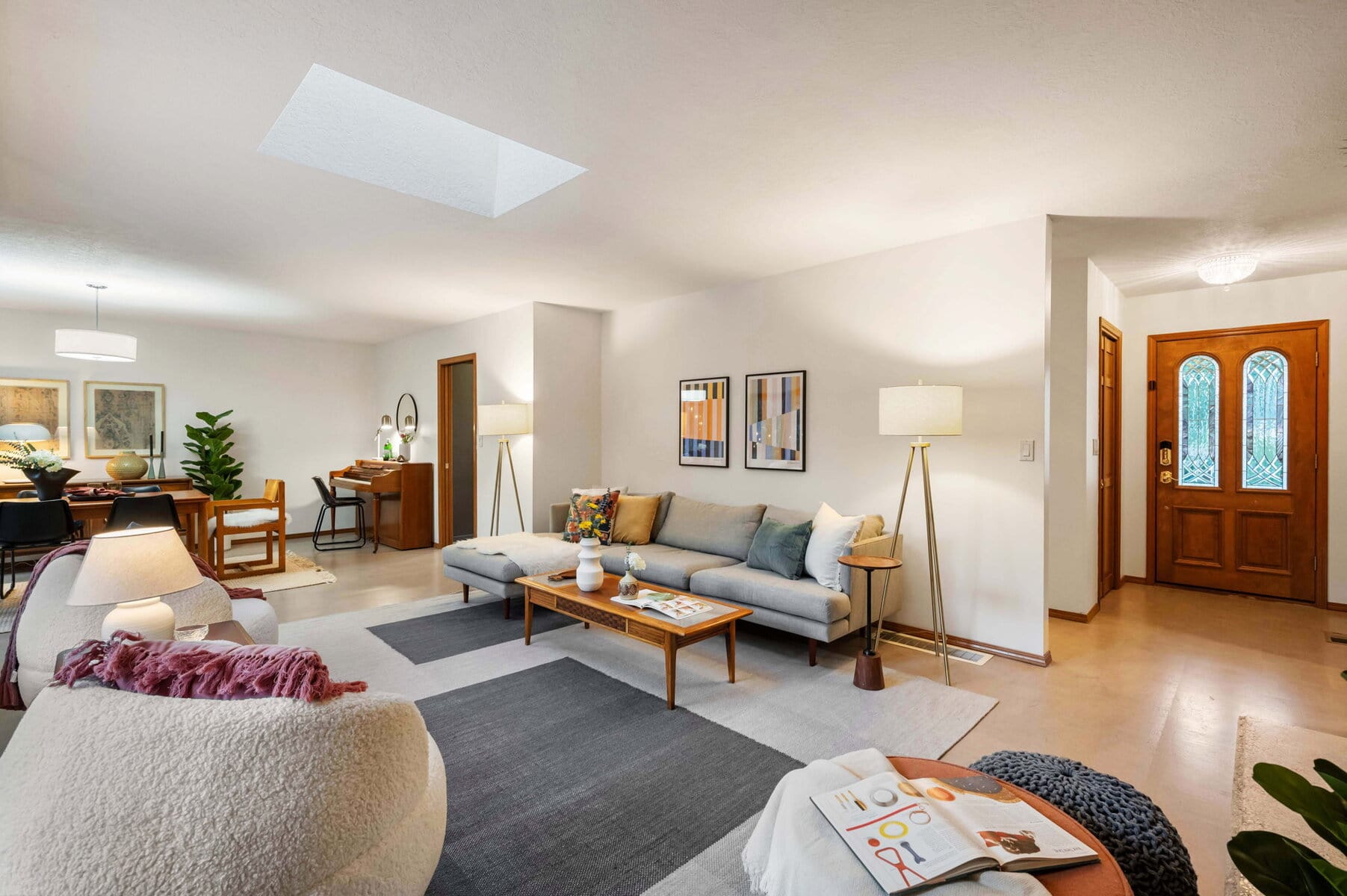 Bright living room with stylish furniture and decor accents.
