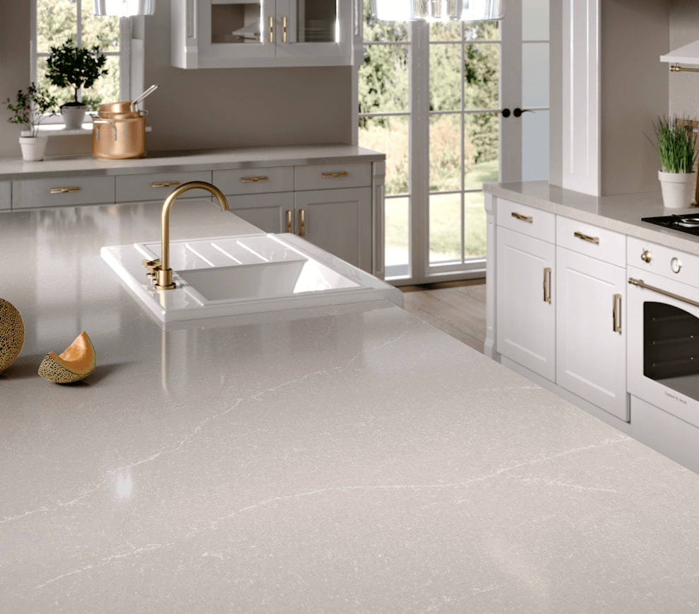 Silestone Desert Silver pale grey countertop sample, showcasing its neutral color and subtle veining for a versatile kitchen design.