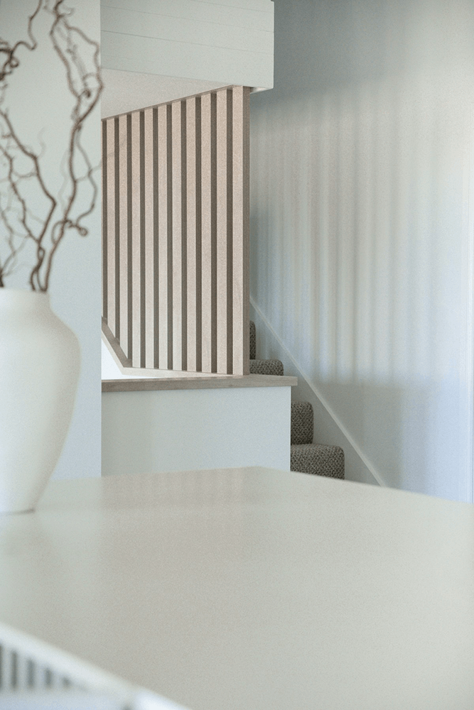 Sleek modern kitchen featuring a countertop in Miami Vena quartz, showcasing its dramatic white color.