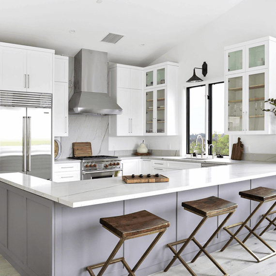 Elegant kitchen with Luce Di Luna quartzite countertops, featuring a durable surface with beautiful natural veining and a cohesive design.
