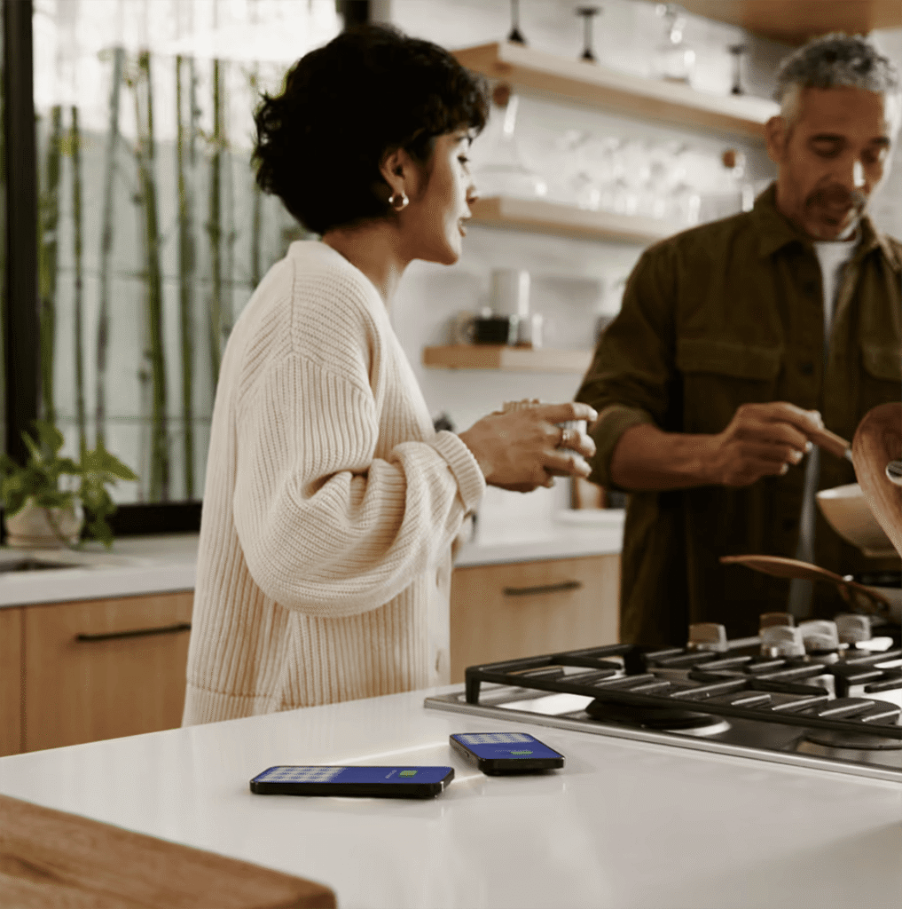 Invisible wireless charging station installed in a stone countertop, providing a clean and modern kitchen surface design by Arlington Marble, Fort Worth.
