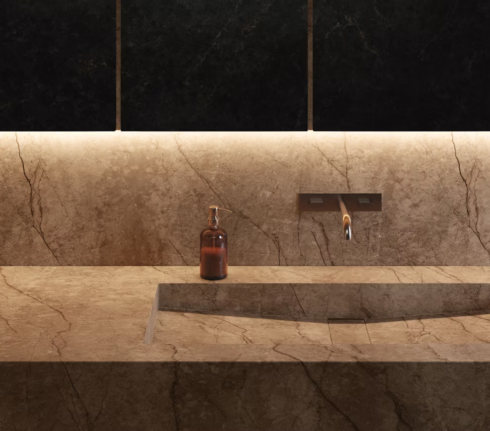 Modern warm taupe kitchen design with custom mineral surface countertops and slab wall cladding in Fort Worth.