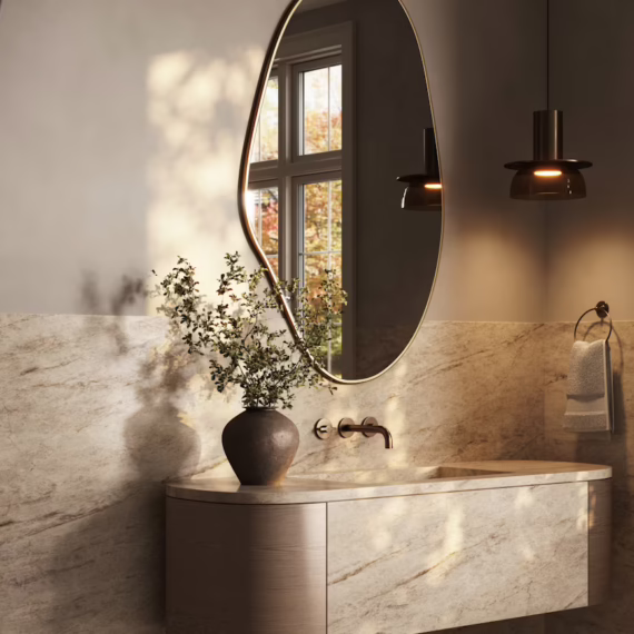 Luxury bathroom remodel featuring a custom floating stone vanity and matching backsplash in Cosentino Eclos Tajnar by Arlington Marble.
