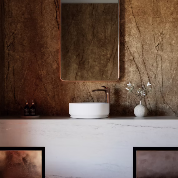 Luxury bathroom vanity detail featuring a white Ivora stone countertop and warm taupe Legnd wall paneling by Arlington Marble.