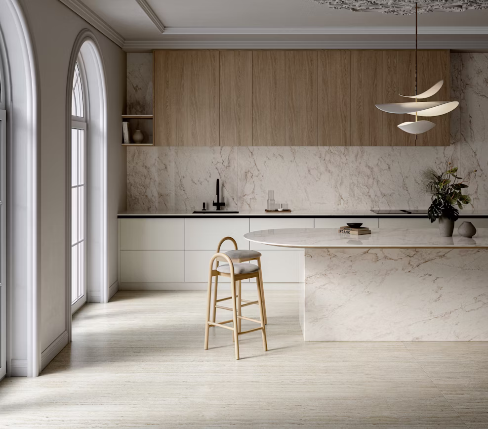 Elegant ivory cream marble-look mineral surface countertops with integrated under-cabinet lighting.