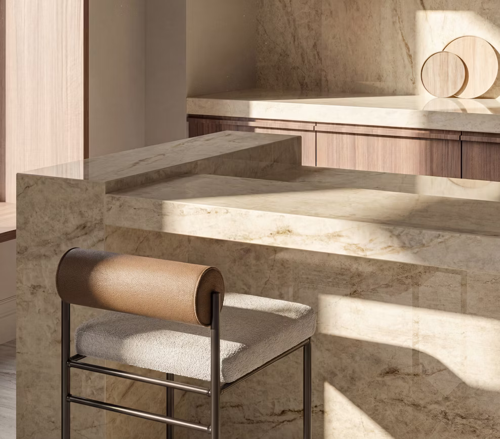 Custom stone breakfast bar with a flawless mitered waterfall edge in Cosentino Eclos Tajnar by Arlington Marble.