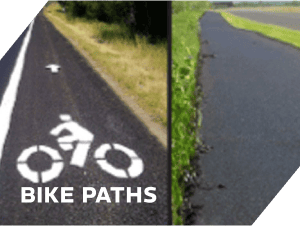 Asphalt bike paths and paved roadways for cycling and transportation.