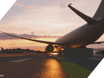 Airplane on runway at sunset, related to road and transportation infrastructure.
