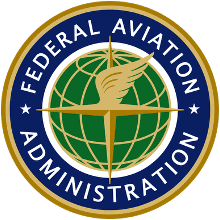 FAA logo with globe and eagle symbol for aviation authority.