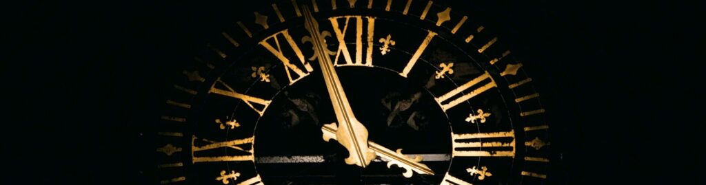 round black and brown analog clock