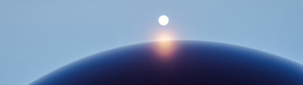 the sun is setting over a blue dome