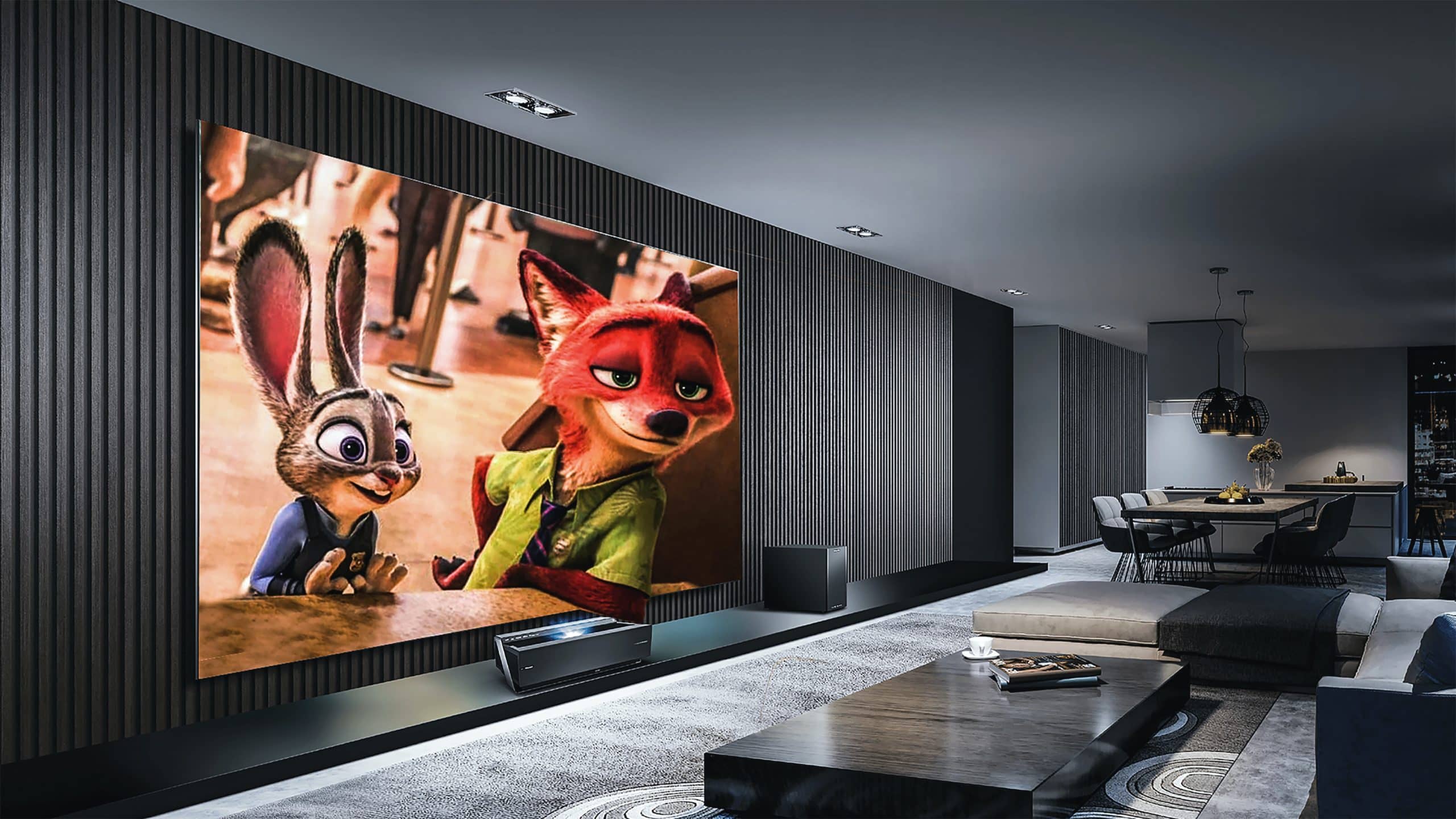 Large projector screen in front of seating in a home theater