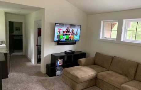 Close-up of bonus room smart TV and Xbox gaming AV installation at Suncadia home