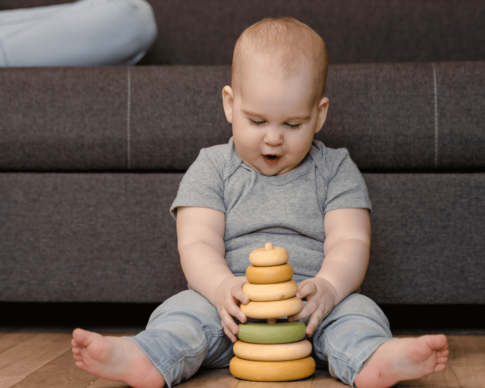 Colorful baby toy stack with rings for baby development and play.