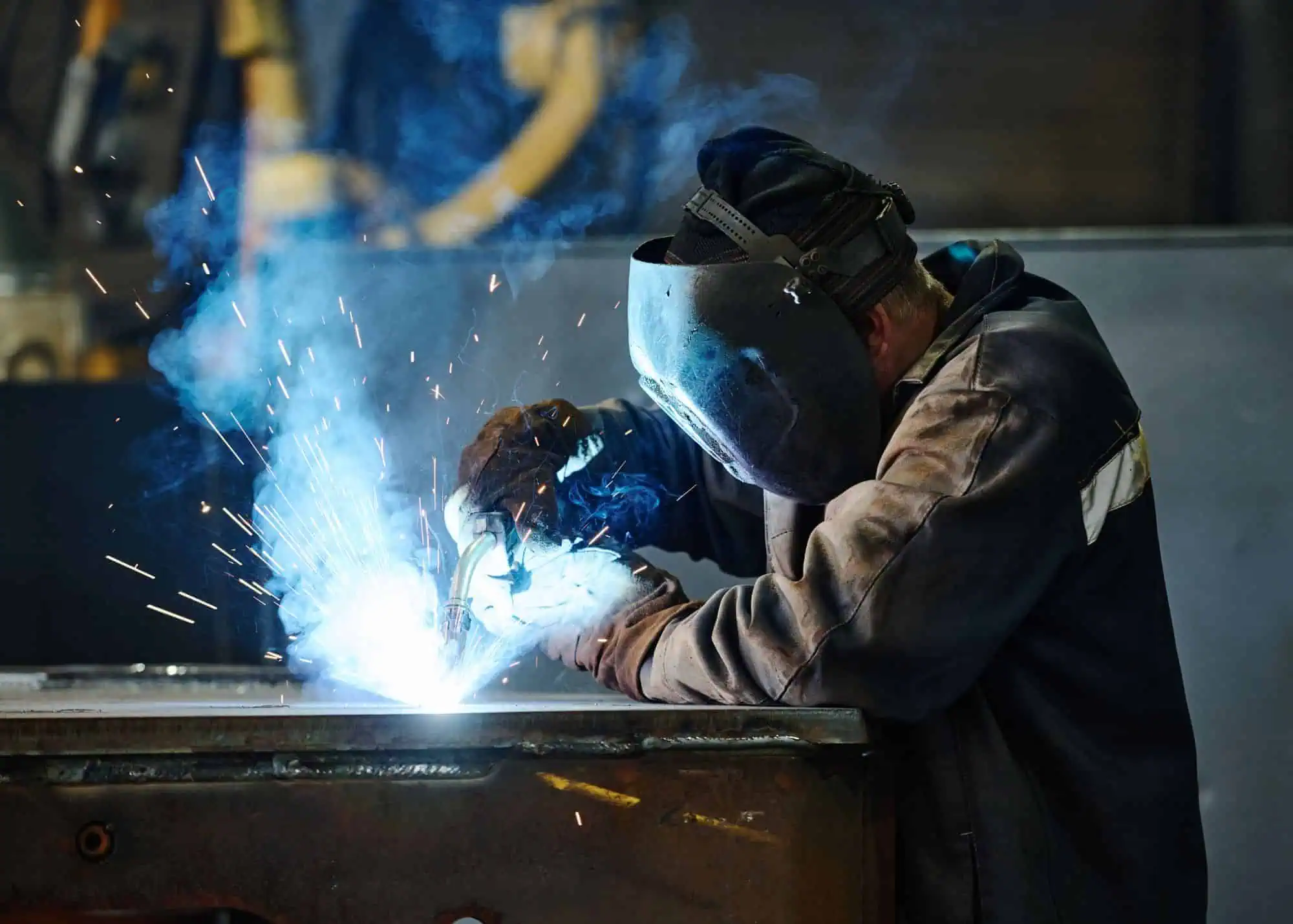 Welding process at B&B Powder, showcasing expert metal fabrication services.