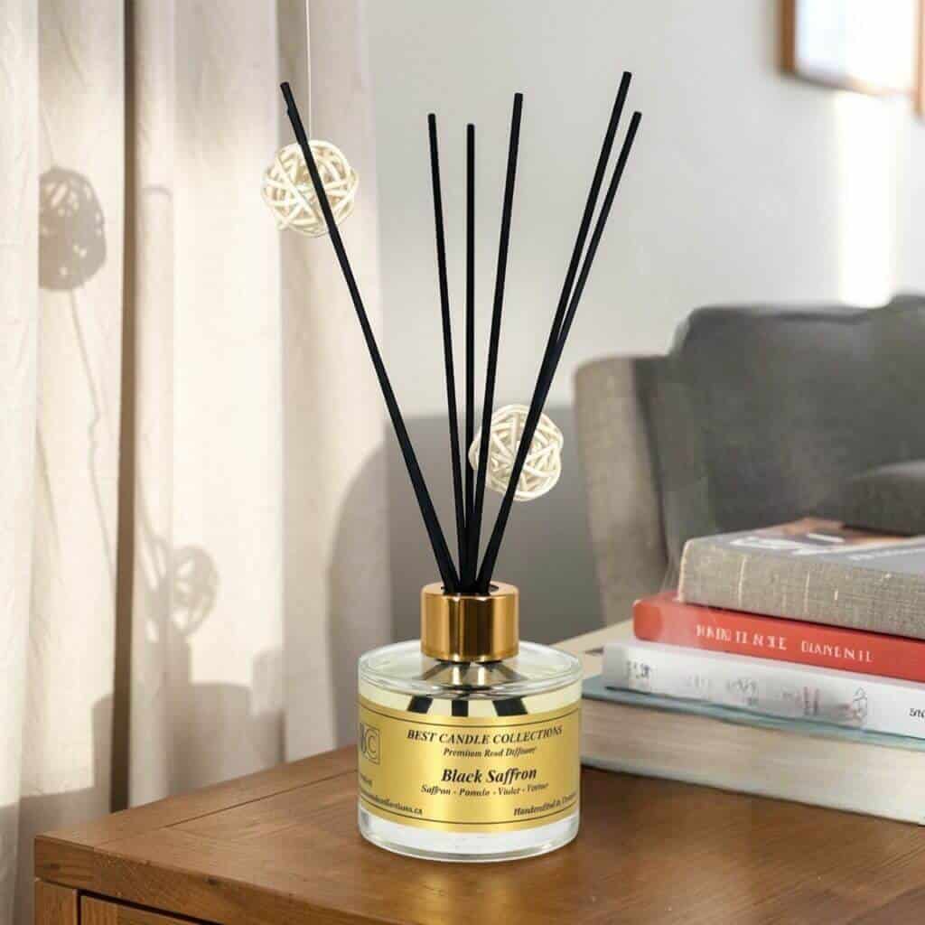 Reed diffuser with black reeds and decorative balls, ideal for enhancing home fragrance.