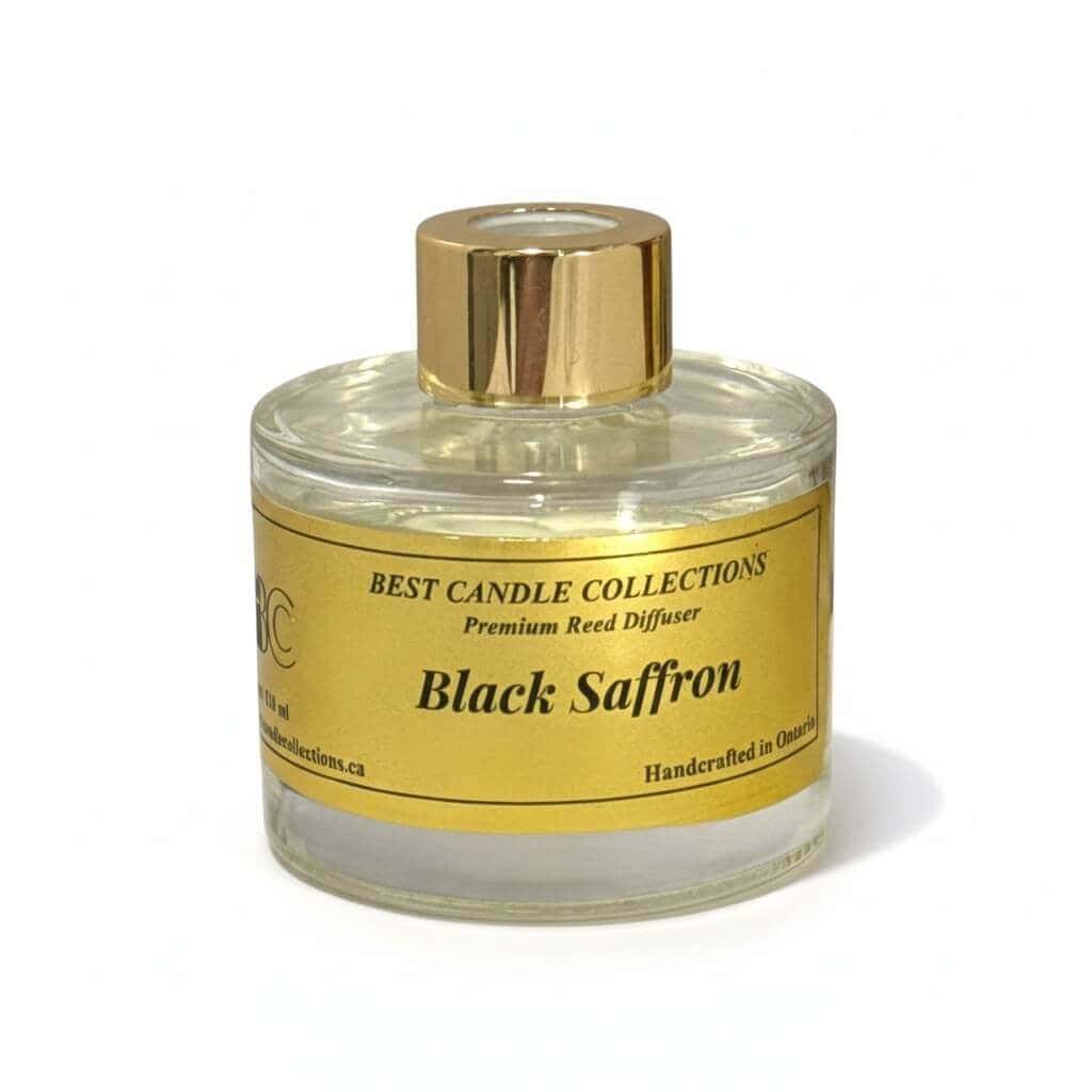 Reed diffuser with black saffron scent for home fragrance. Elegant glass bottle with gold cap, ideal.