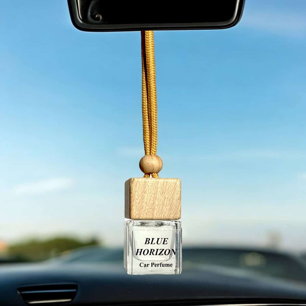 Car perfume diffuser with Blue Horizon scent for fresh driving experience.