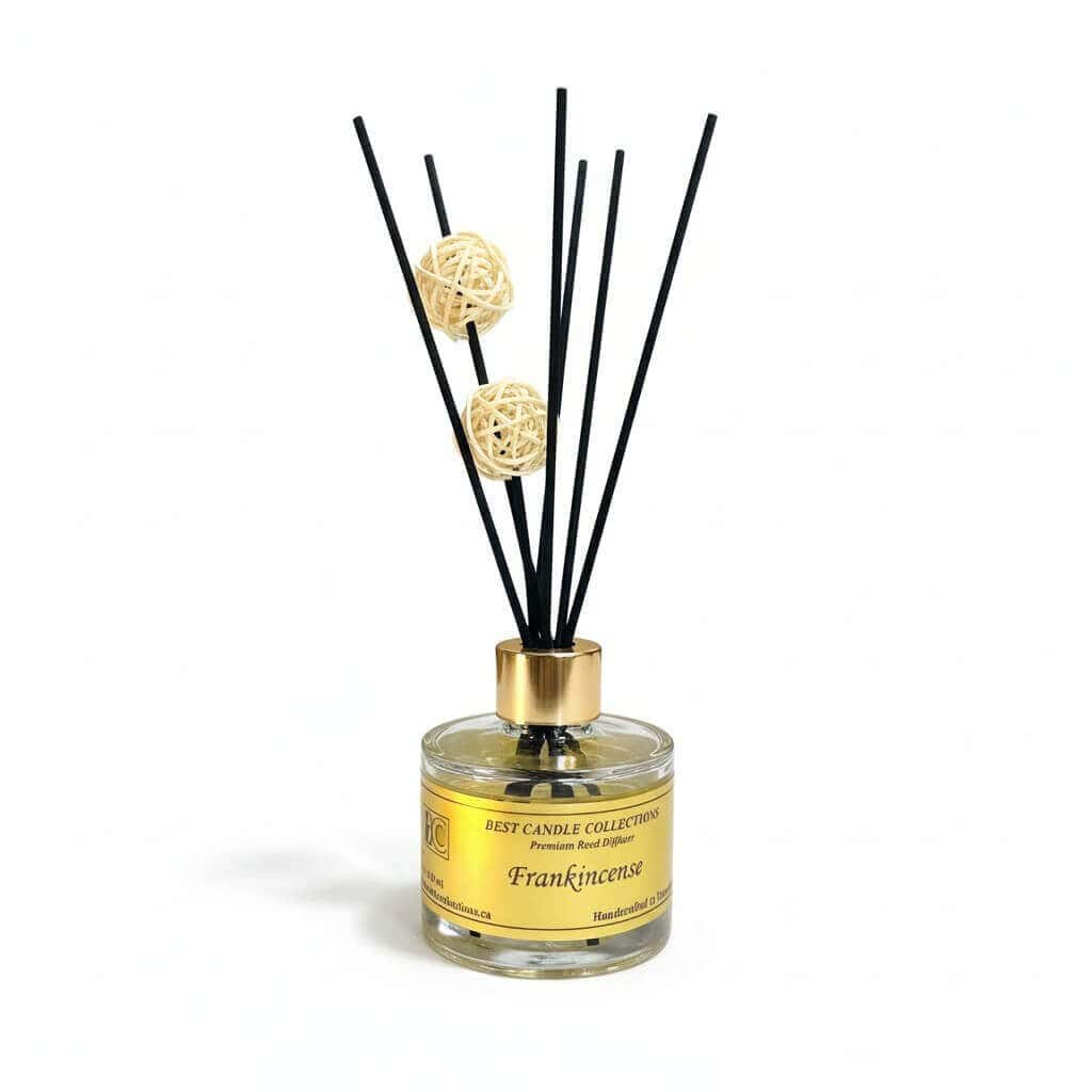 Reed diffuser with black sticks and decorative rattan balls for a fragrant home.