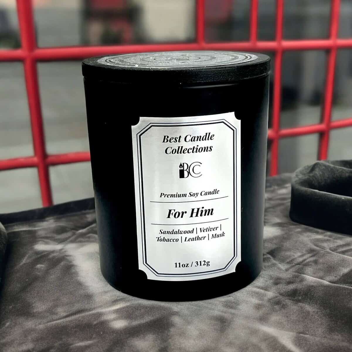 For Him soy wax candle in black jar, 11oz, with sandalwood, vetiver, tobacco, leather, and musk scen.