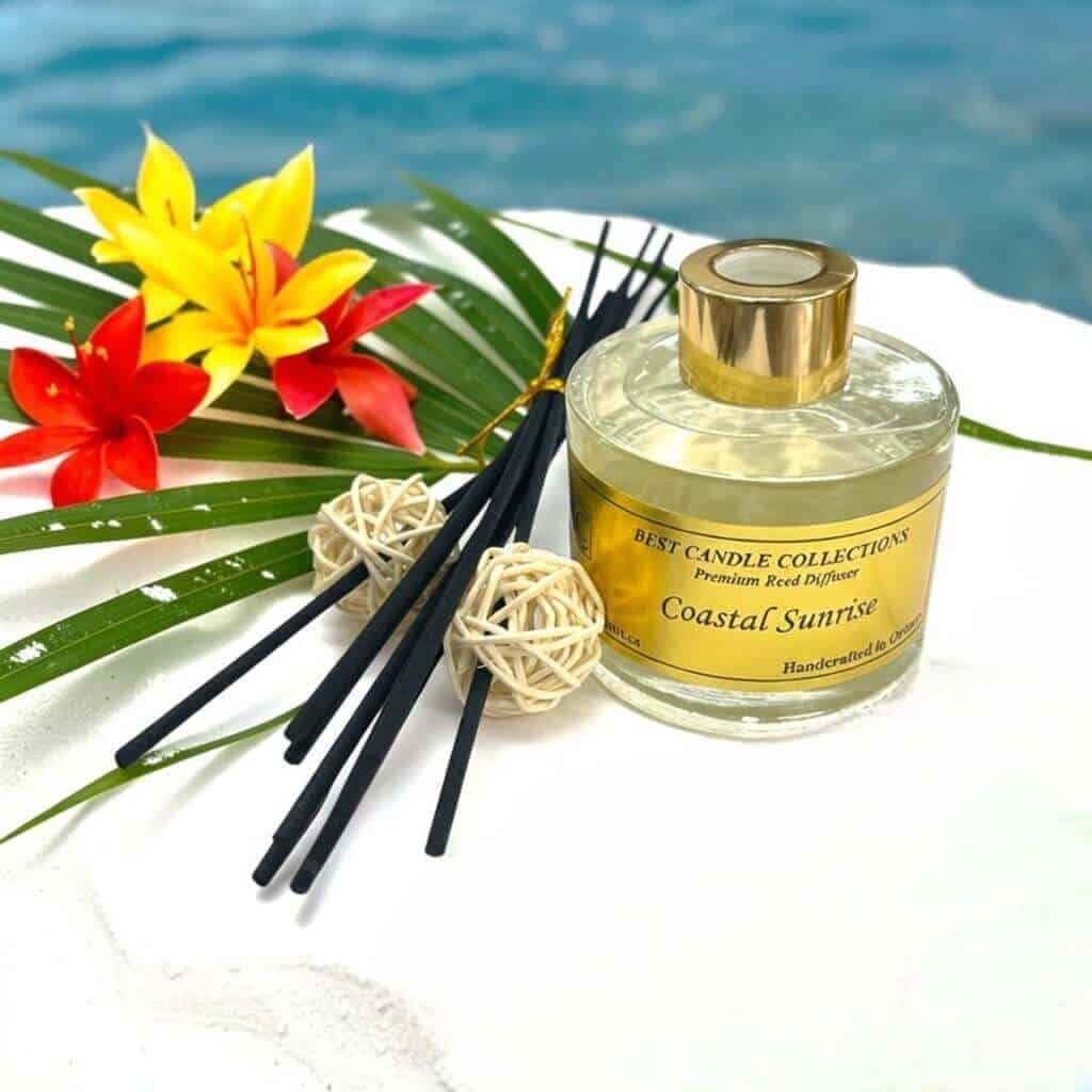 Reed diffuser with Coastal Sunrise scent and tropical flowers. Perfect for creating a relaxing coast.
