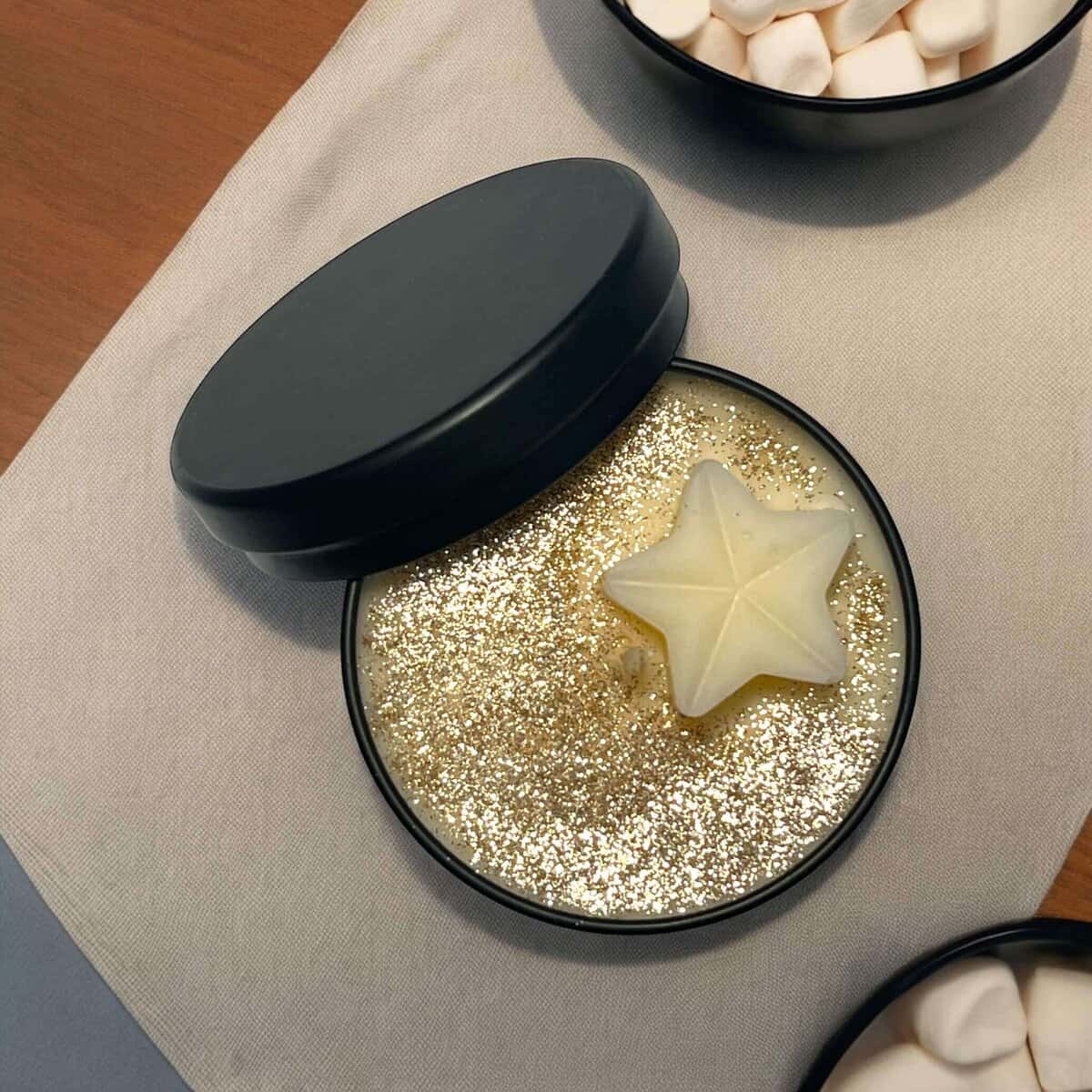 Star-shaped wax melts in a decorative candle gift box for home fragrance.