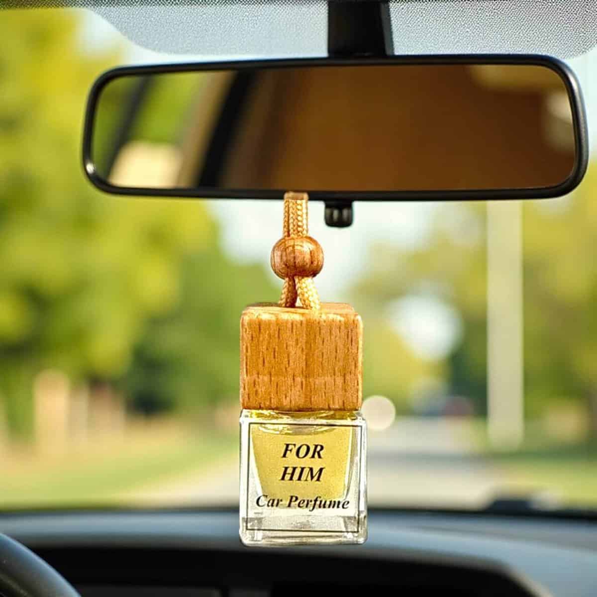 Car diffuser air freshener for men, stylish wooden design, ideal for vehicle interior.