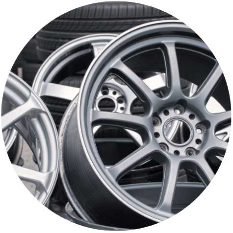 Premium alloy wheels and tires for vehicle performance and style.