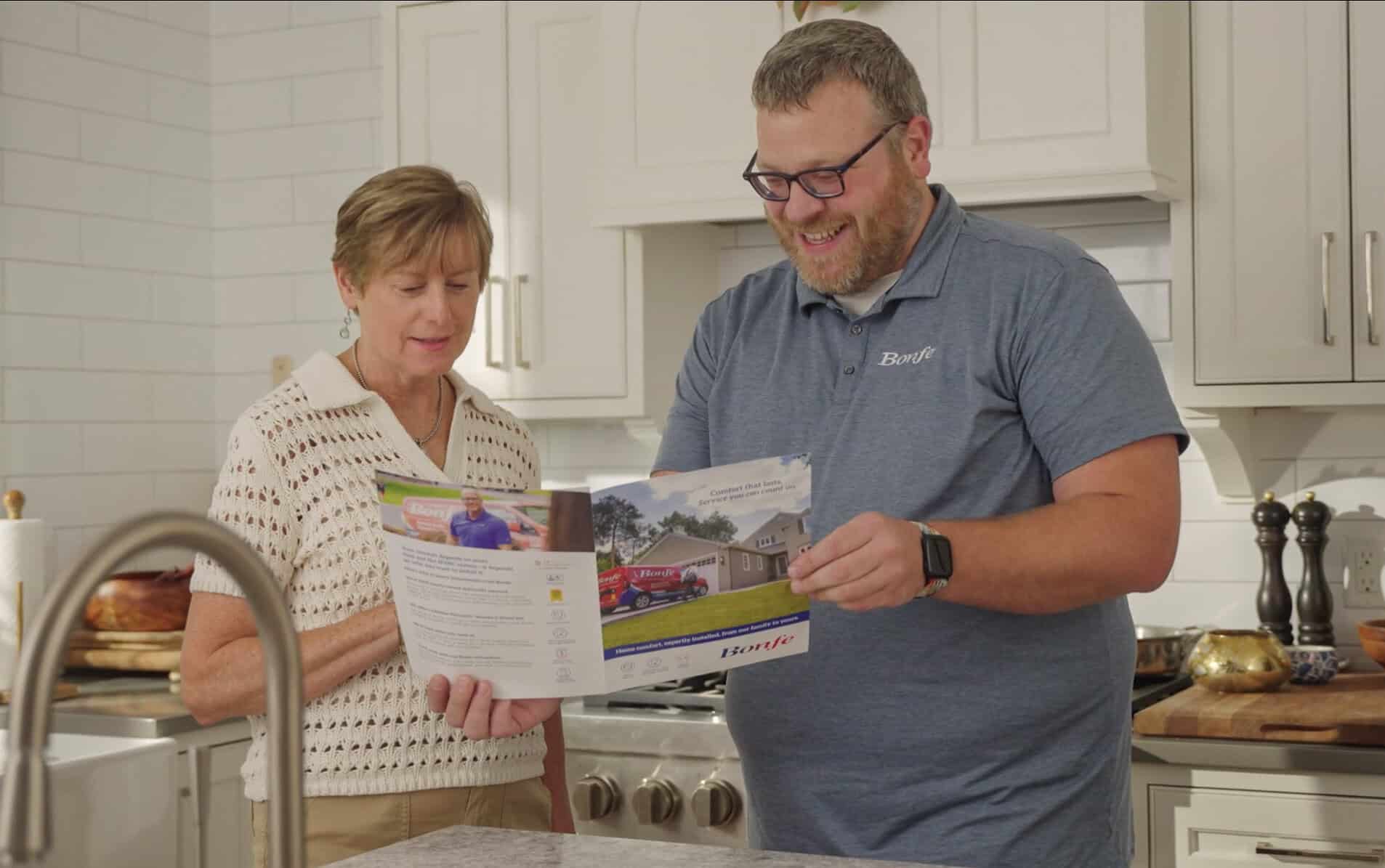 Bonfe technician meeting with homeowner about membership plans