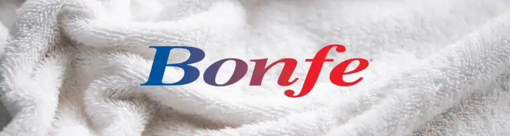 The word “Bonfe,” styled in an eye-catching gradient from blue to red and referencing the Bonfe Insider November 2025 edition, appears prominently over a close-up of a white textured towel, highlighting Bonfe’s commitment to quality and attention to detail.
